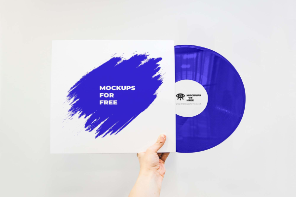 Old Vinyl Record In Hand Mockup