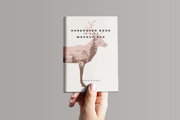 Hardcover Book in Hand Mockup