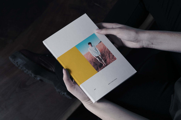 Book in Hand Mockup