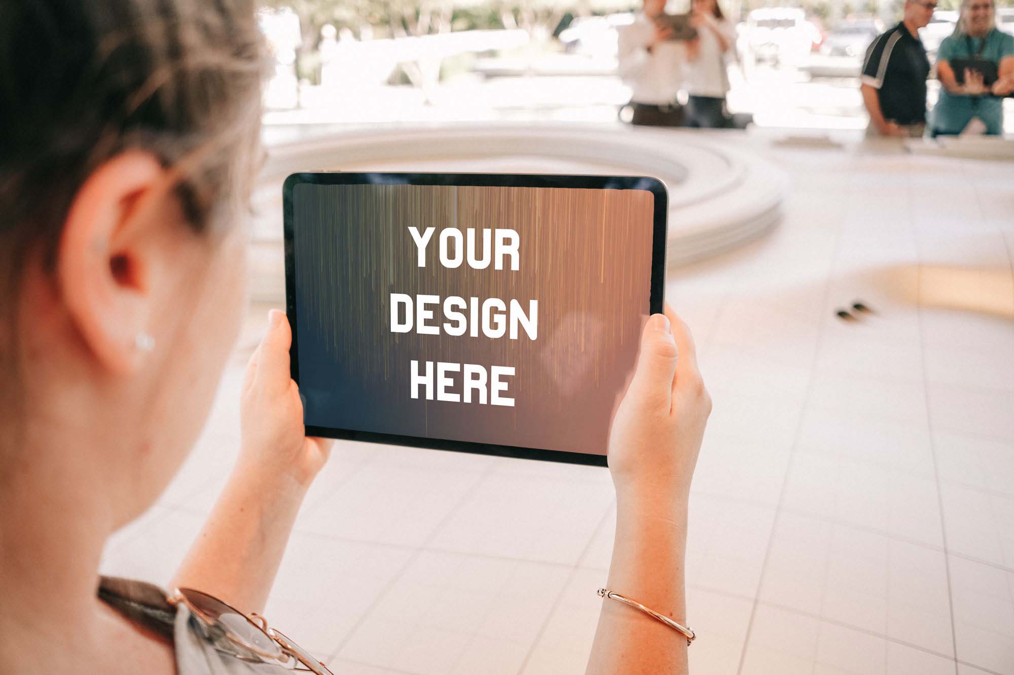 Woman Holding an iPad Pro Mockup