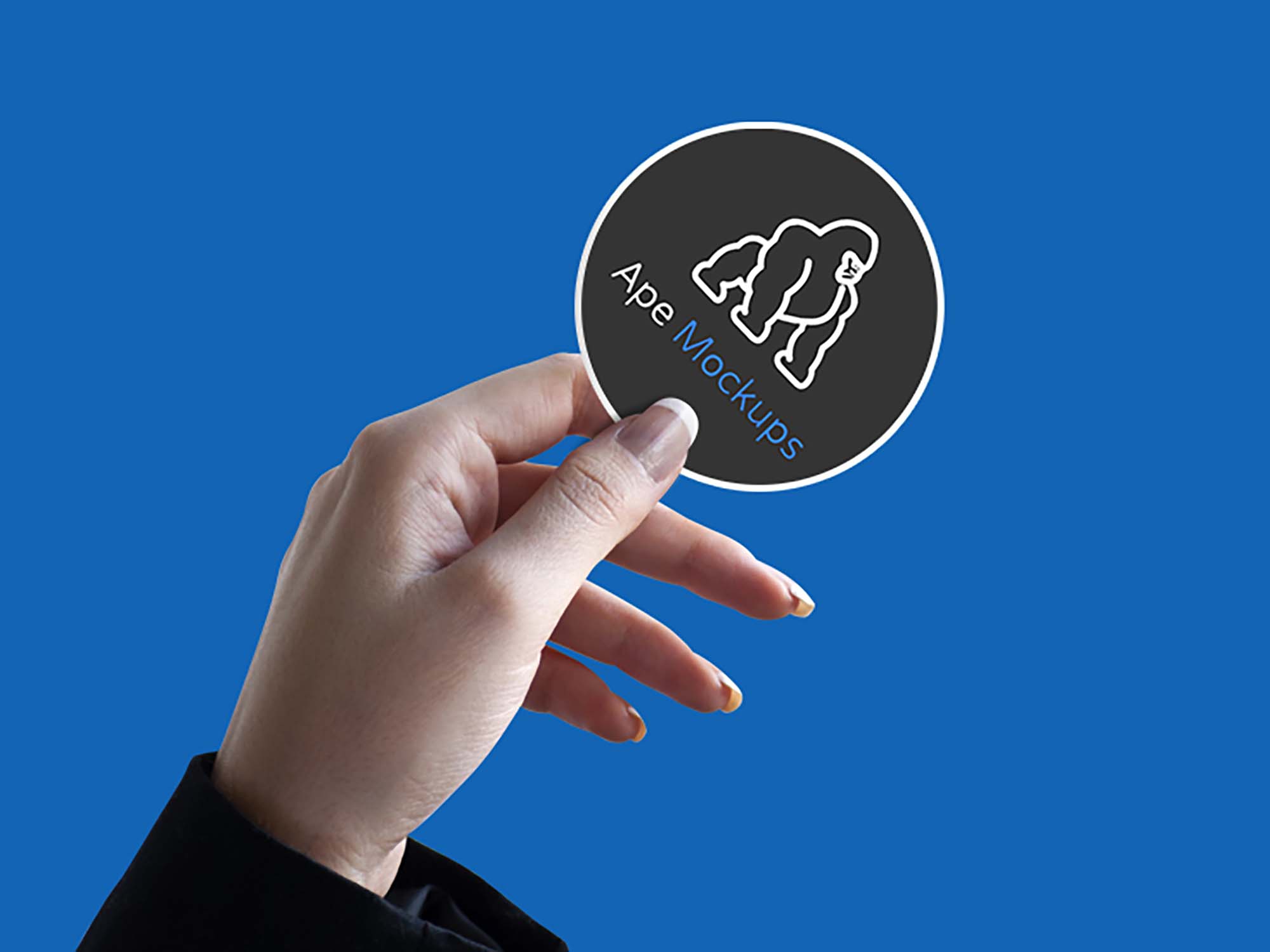 Hand Holding a Sticker Mockup